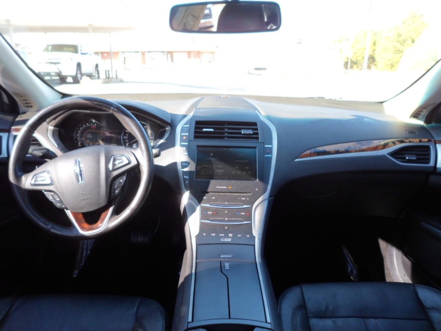 2014 BLACK /BLACK Lincoln MKZ (3LN6L2G9XER) , AUTOMATIC transmission, located at 2812 White Horse Road, Greenville, SC, 29611, (864) 269-1711, 34.808655, -82.434776 - 2.0 LITER 4 CYLINDER ENGINE,19 ICH ALLOY WHEELS,ANTI LOCK BRAKES,ANTI THEFT SYSTEM,TILT/REACH STEERING,2 ZONE A/C CLITMATE CONTROL,DUAL AIRBAGS,FRONT/REAR SIDE AIRBAGS,BODY COLOR BUMPERS,MIRRORS,AND DOOR HANDLES,CRUISE CONTROL,FOG LIGHTS,AUTOMATIC HEADLIGHTS,USB OUTLET,LIT VANITY MIRRORS,LEATHER SEA - Photo#5